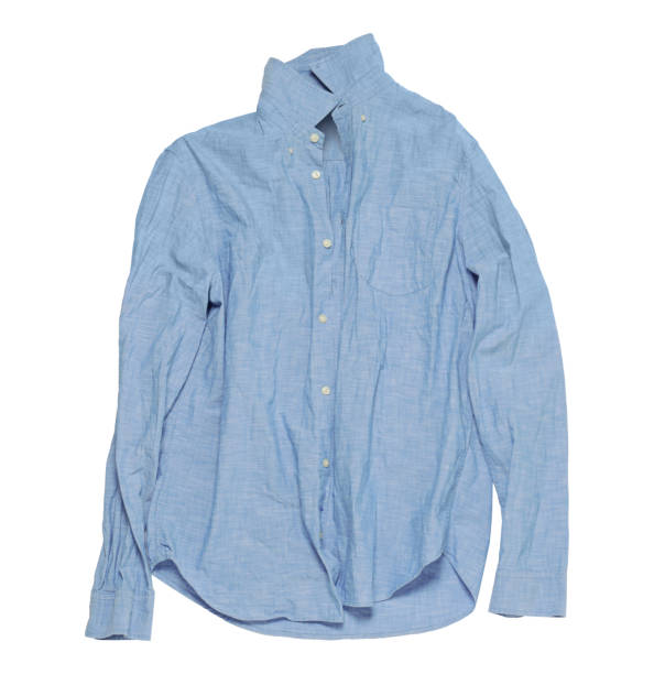 istock Crumpled light blue shirt on white background, top view 1745836670