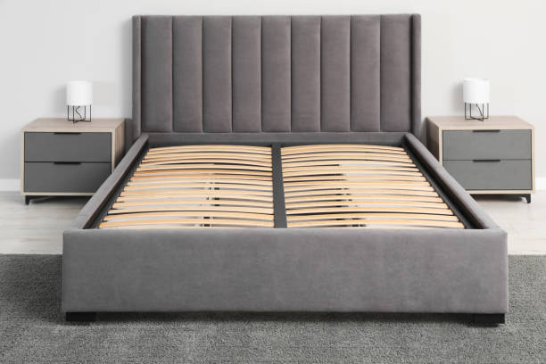 istock Comfortable bed with storage space for bedding under slatted base in room 1745837826