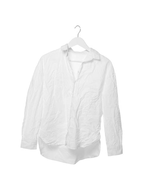 istock Crumpled shirt on hanger against white background 1745845625