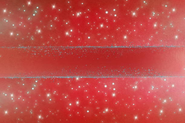 Abstract red sparkle background template with copy space.Christmas blur glitter bokeh festive backdrop.