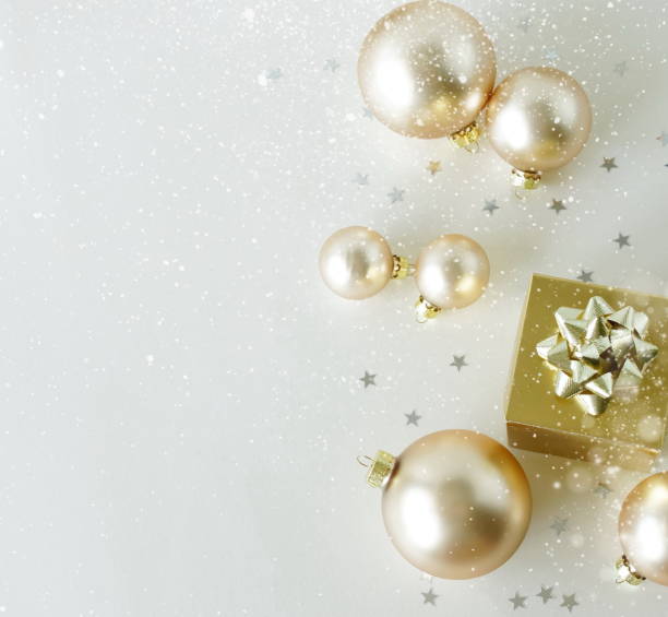 istock Christmas background template top view with copy space . Gold balls and gift box frame.Beautiful Xmas greeting card.New Year decor frame mockup . 1745858504