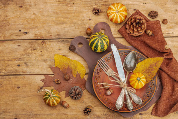 istock Autumn table setting. Thanksgiving cutlery, traditional fall decor, flat lay. Festive cozy mood 1745898613
