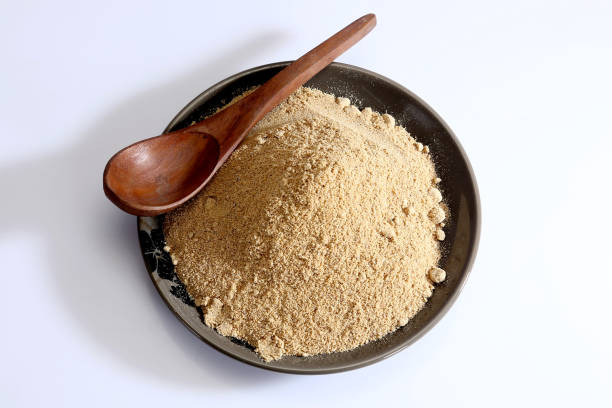 istock Aamchoor Powder in a b;ack plate with spoon 1745903856