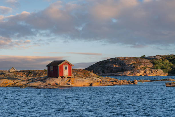 istock Lone hut on granite rock at sunrise, Sweden 1745918861