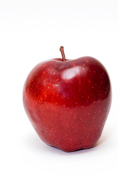 apple auf weiß - red delicious apple stock-fotos und bilder