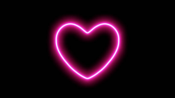istock 3D Illustration.Neon hearts on black background. Neon material glowing pink. 1745959869