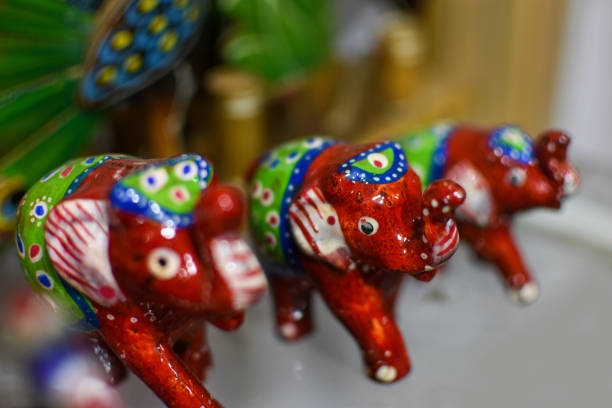 istock Colourful elephant toys with decoration, indian style on white background 1745979691