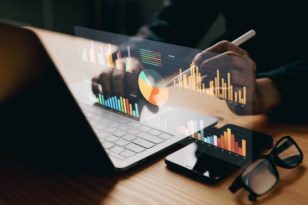 istock The executive reviewed the statistics graph to assess our recent performance. Positive mindset, and I carry a notebook to jot down my ideas and goals. 1746010046