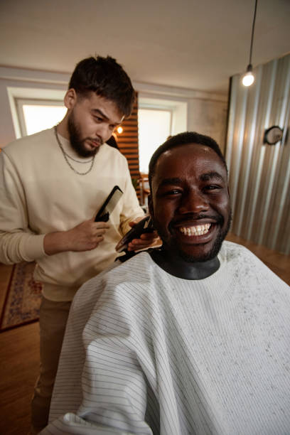 istock Man making selfie portrait in barber shop 1746026984