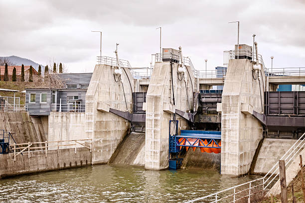 istock river water power electricity energy dam construction 174603881