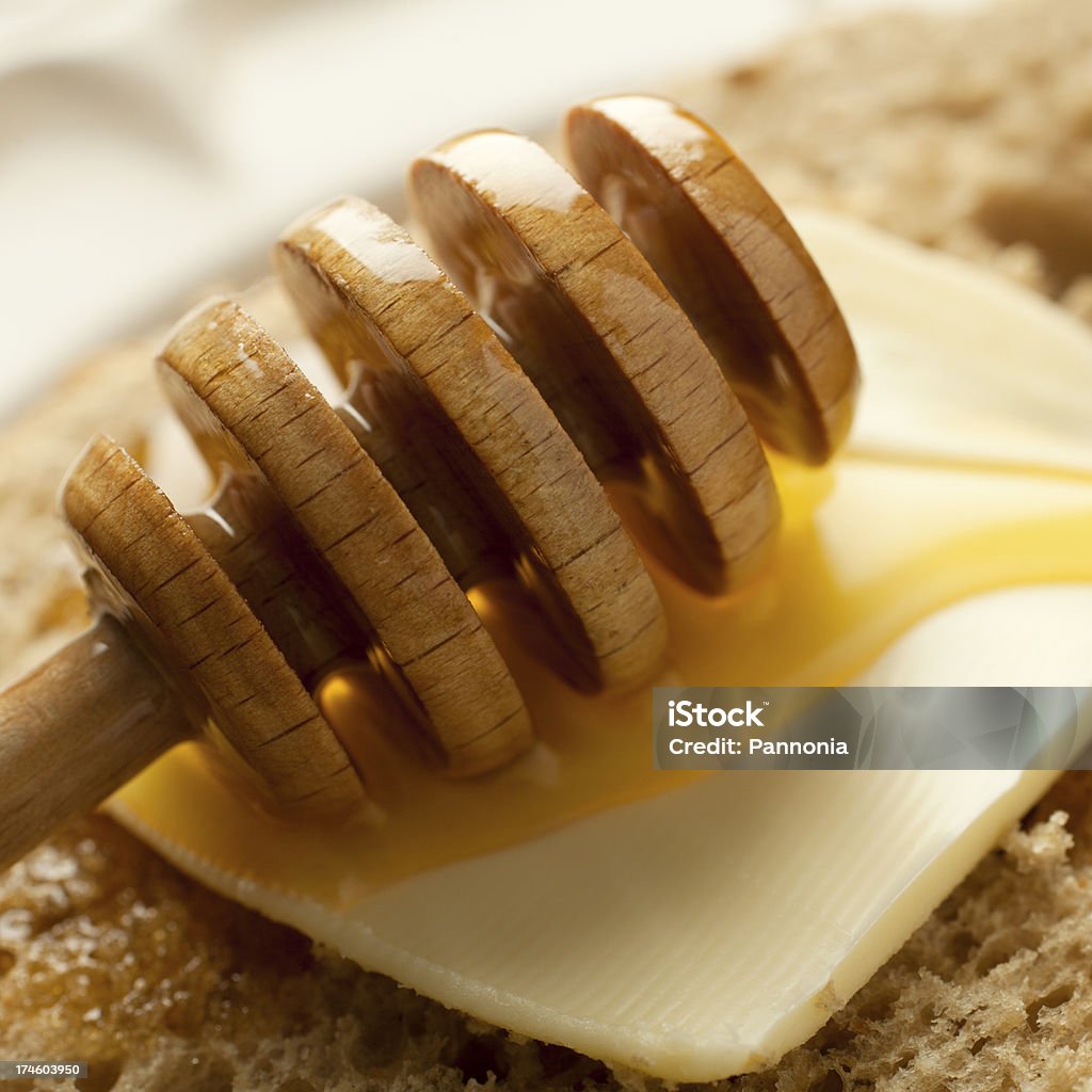 Honig und Brot mit Butter - Lizenzfrei Brotsorte Stock-Foto