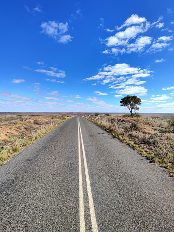 Roat towards the famous Mundi Mundi Lookout, a few chilometers from Silverton where scenes of the movie Mad Max 2 were filmed, an amazing viewpoint on top of the Barrier Ranges, New South Wales, Australia.