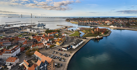 Aerial view of harbor in small Danish town Korsoer and the Great Belt Bridge