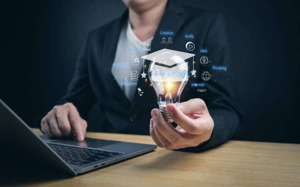 istock E-learning online graduate course concept online male hand holding light bulb display graduation 1746077641