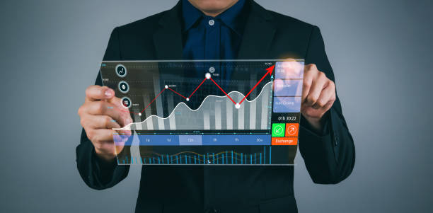 istock Trader Showing a growing virtual holographic stock 1746093770