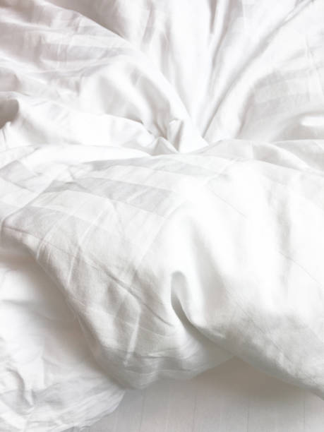 istock White Pillow On Bed And With Wrinkle Messy Blanket In Bedroom, From Sleeping In A Long Night Winter 1746096079