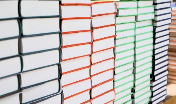 istock stacks of books - texturee and background 1746100626