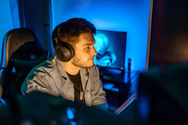 istock Pro gamer playing online games at home with ambient lighting 1746106685