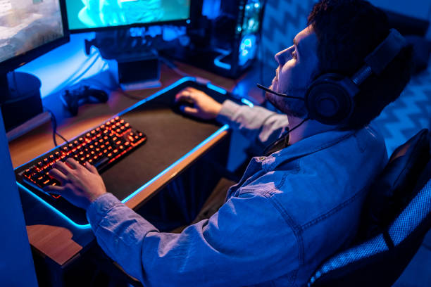 istock Pro gamer playing online games at home with ambient lighting 1746106689