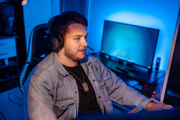 istock Pro gamer playing online games at home with ambient lighting 1746107194