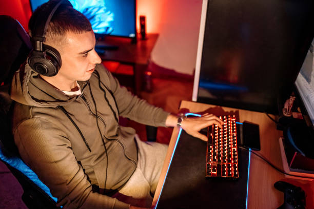 istock Pro gamer playing online games at home with ambient lighting 1746107755