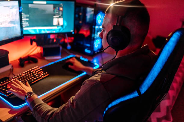 istock Pro gamer playing online games at home with ambient lighting 1746108276