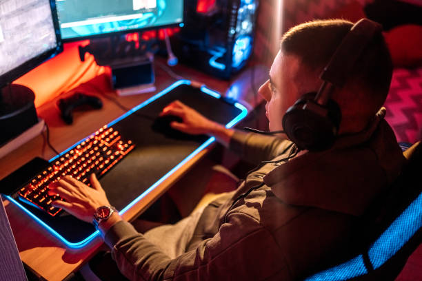 istock Pro gamer playing online games at home with ambient lighting 1746108289