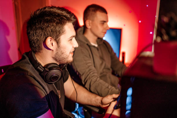 istock Pro gamer playing online games at home with ambient lighting 1746108886