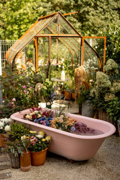 istock Beautiful garden with pink bathtub 1746115996