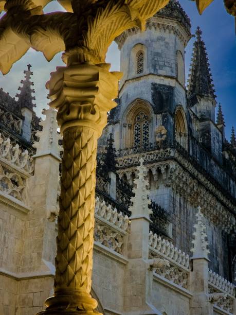 istock a large tall cathedral towering over a city with a clock on the building 1746118239