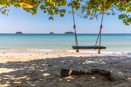 Natural swing on tropical beach, Klong Prao Beach, Koh Chang island, Thailand.