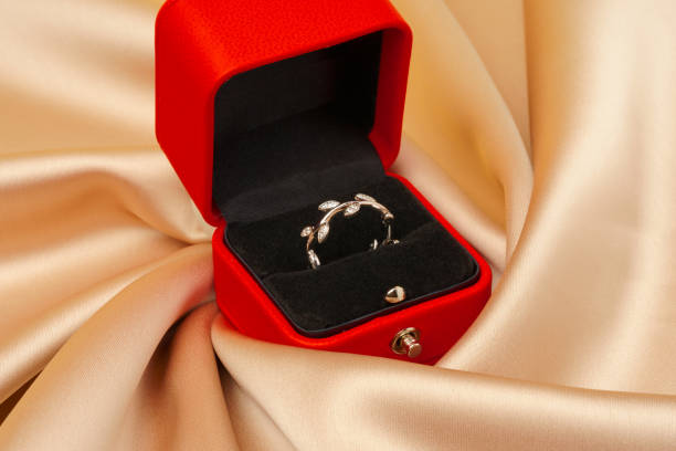 istock Golden ring in red jewelry box close up 1746141477