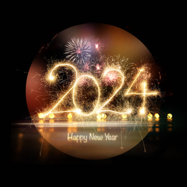 istock Sparkler Happy New Year 2024 with fireworks 1746143732