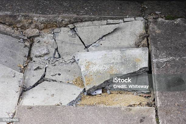 Broken Pavement Sidewalk Damage Cracked Paving Stones Next To Kerb Stock Photo - Download Image Now