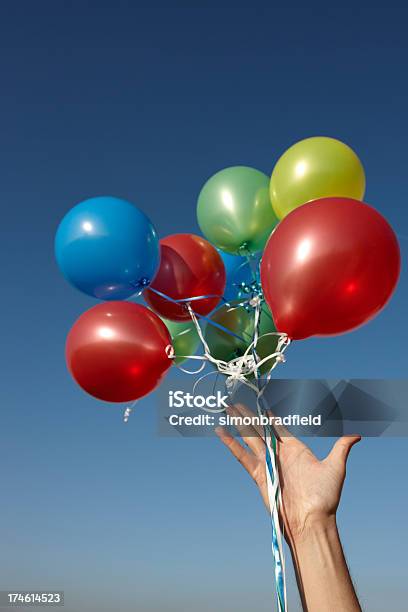 Balloon Release Stock Photo - Download Image Now - Balloon, Releasing, Blue
