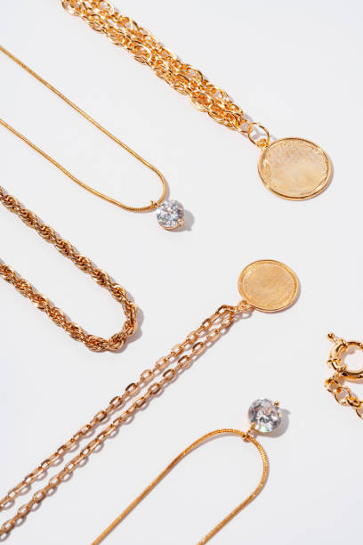 istock Set of gold chains with pendant on white background 1746148754