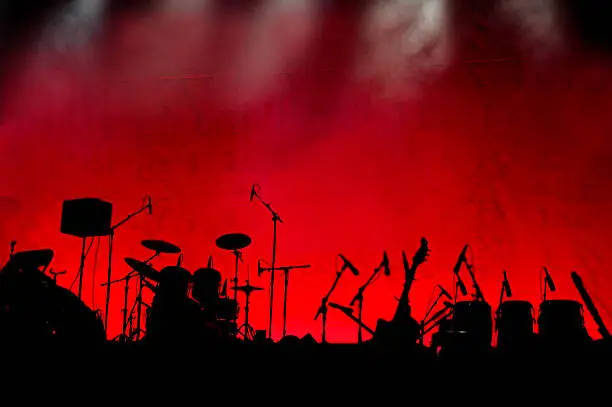 A stage in silhouette before a concert