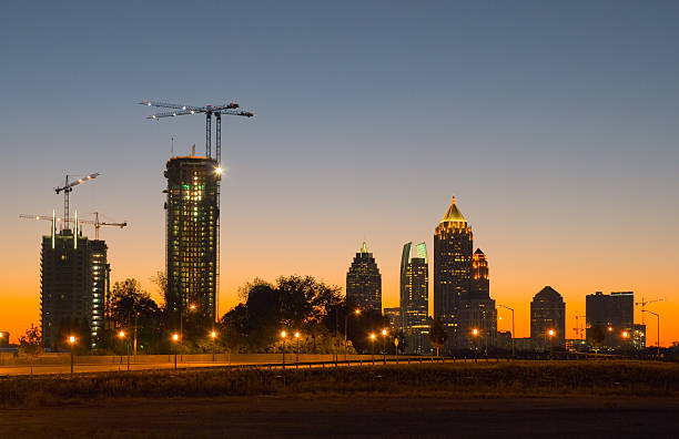 Atlanta Midtown skyline backlit at dusk / dawn.