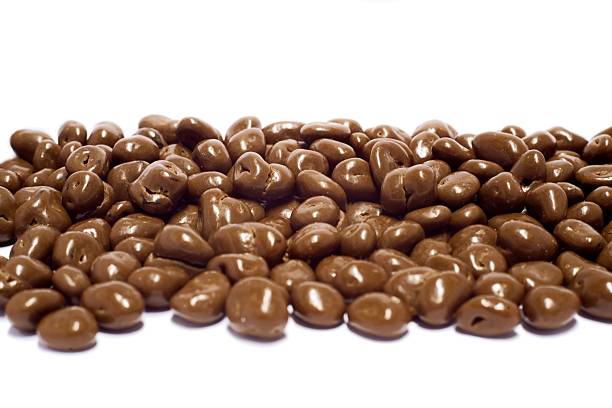 Chocolate with raisins isolated on white background