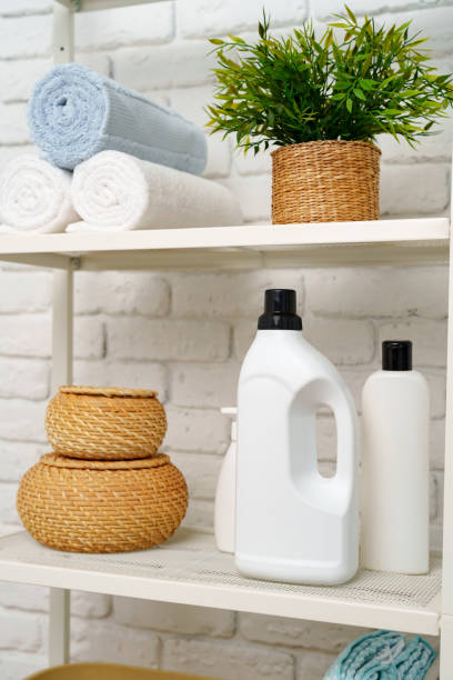 istock Rolled fluffy towels on shelf in bathroom 1746158468