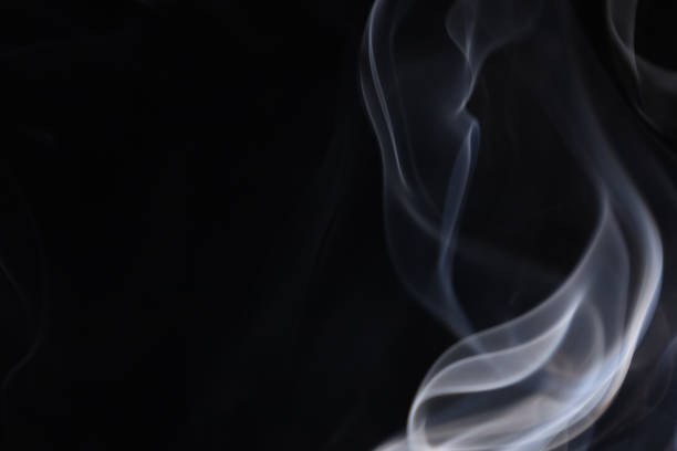 istock White silver smoke on a dark background, colourful abstract 1746162427