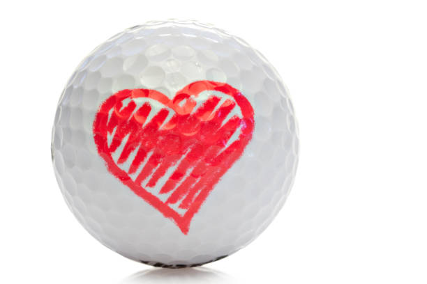 Happy golfer cheering on putting green on a foggy day at the golf course