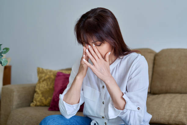 istock Middle-aged woman experiencing stress, difficulties, headache 1746173292