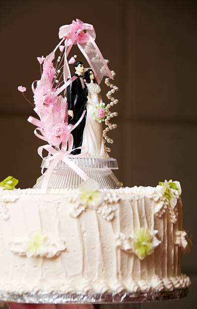 istock wedding cake and topper figurines 174617573
