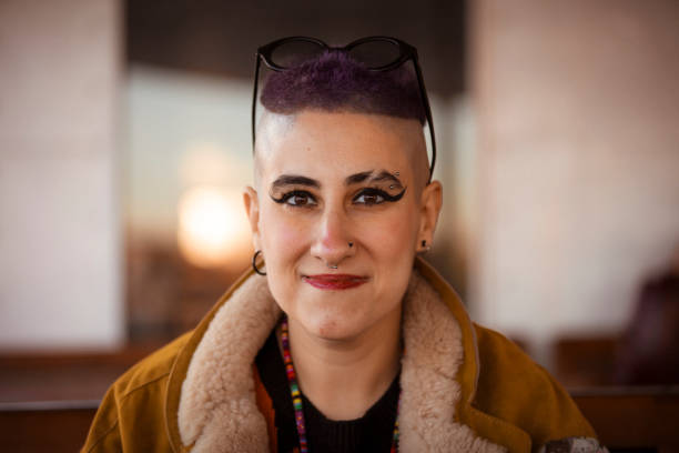 istock Portrait of purple haired non-binary person. 1746178980