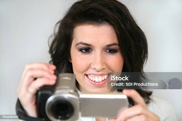 Woman Having Fun Videoing Stock Photo - Download Image Now - Adult, Adults Only, Beautiful People