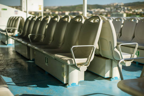 View of empty outdoor seats on ferry.
