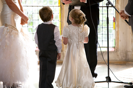 page boy and flower girl during ceremony
