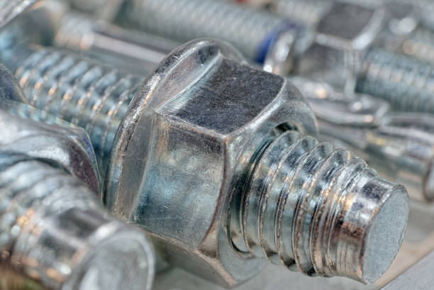 istock Group of galvanized screw-bolts with nuts and washers 1746191295