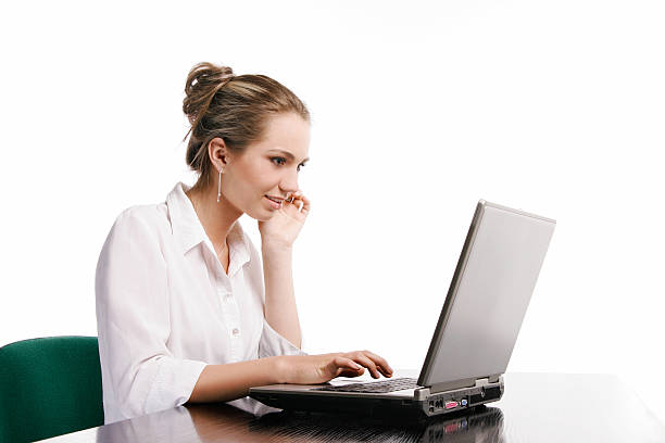 Woman working with computer stock photo